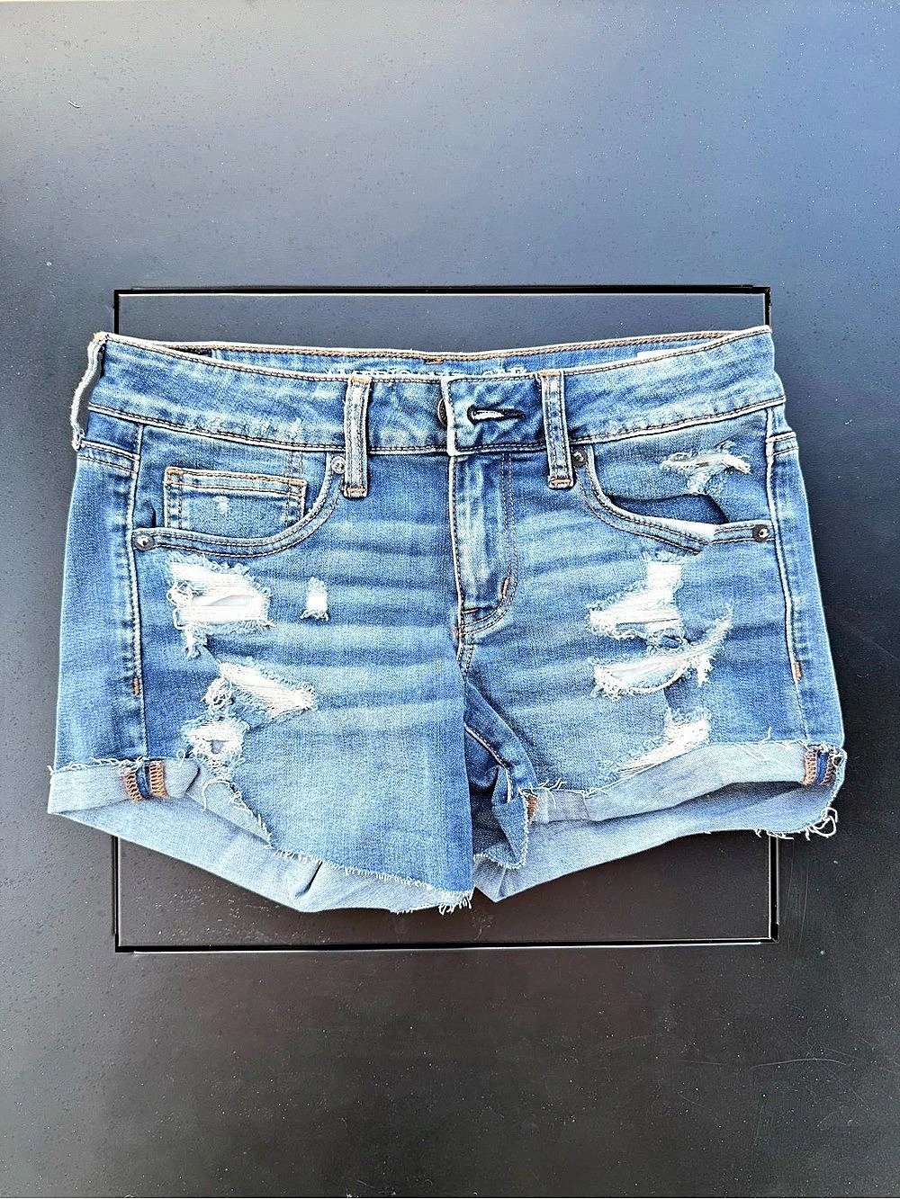 American Eagle Super Low Shortie Distressed Denim Shorts